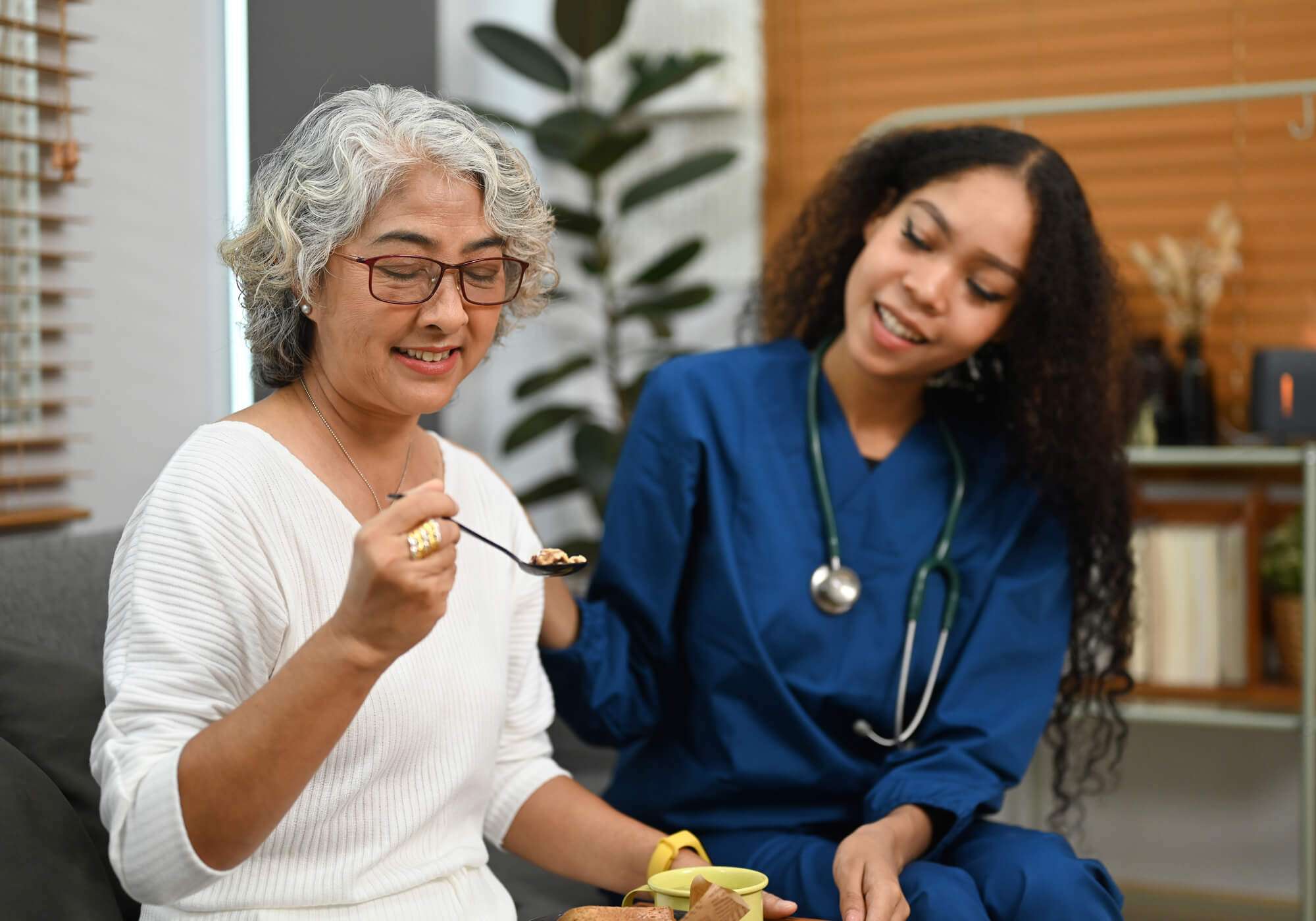 healthcare-worker-or-nurse-caregiver-taking-care-o-MYKW6HD.jpg